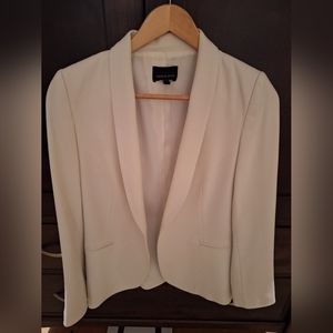 Judith and Charles white blazer